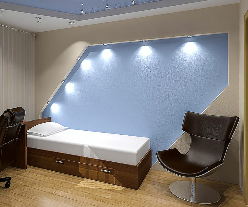 bedroom with recessed lights on wall and ceiling