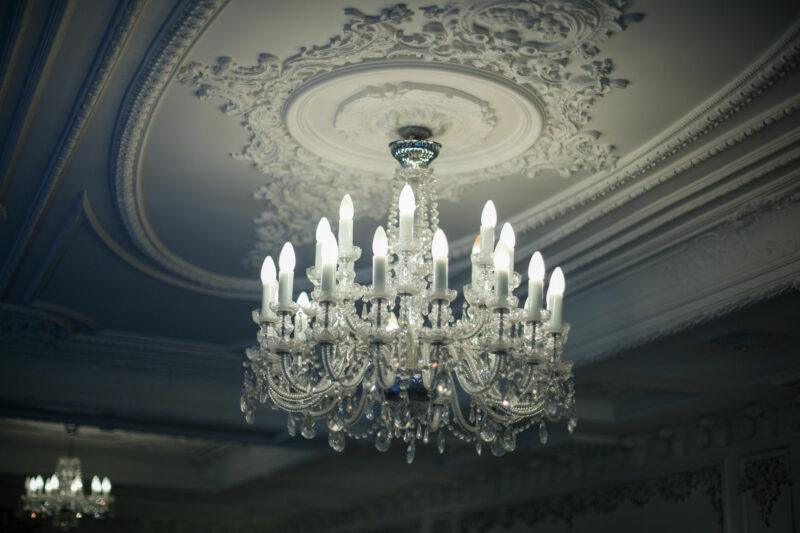 eye-catching chandeliers on foyer ceiling