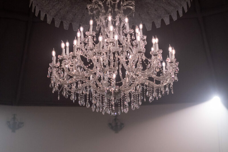 chandelier hanging on ceiling in dining room