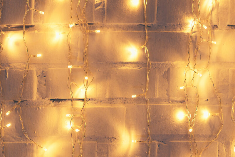fairy lights hanging on a wall