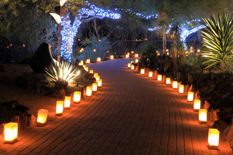 driveway with multiple light fixtures on both sides