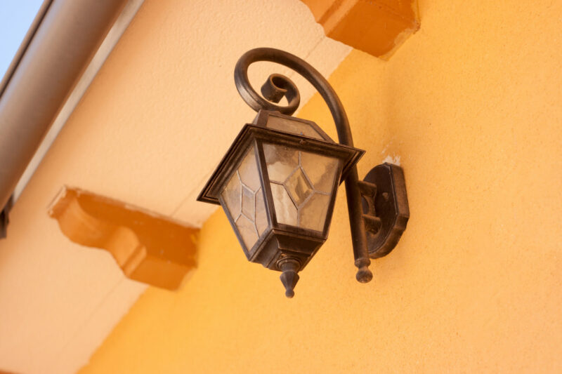 wall sconce lamp on the house wall