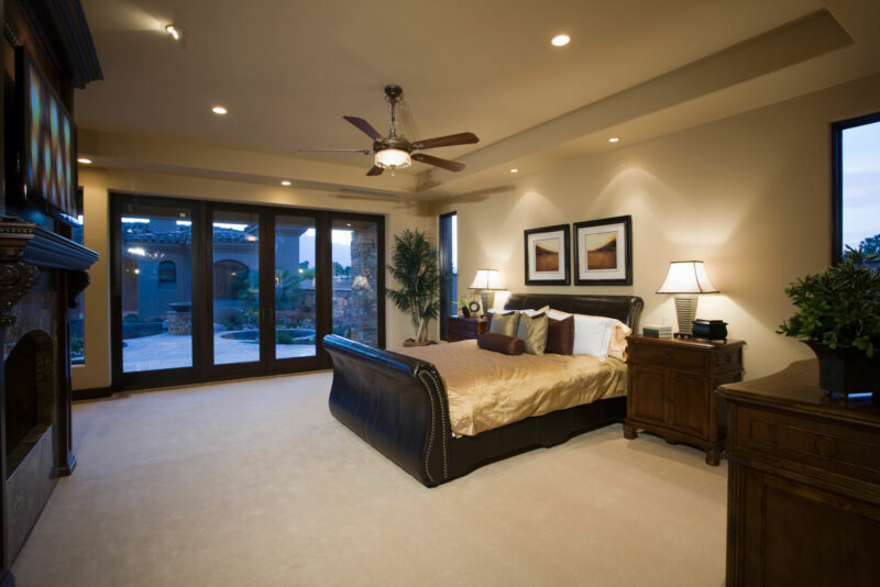 bedroom with recessed lights and ceiling fan